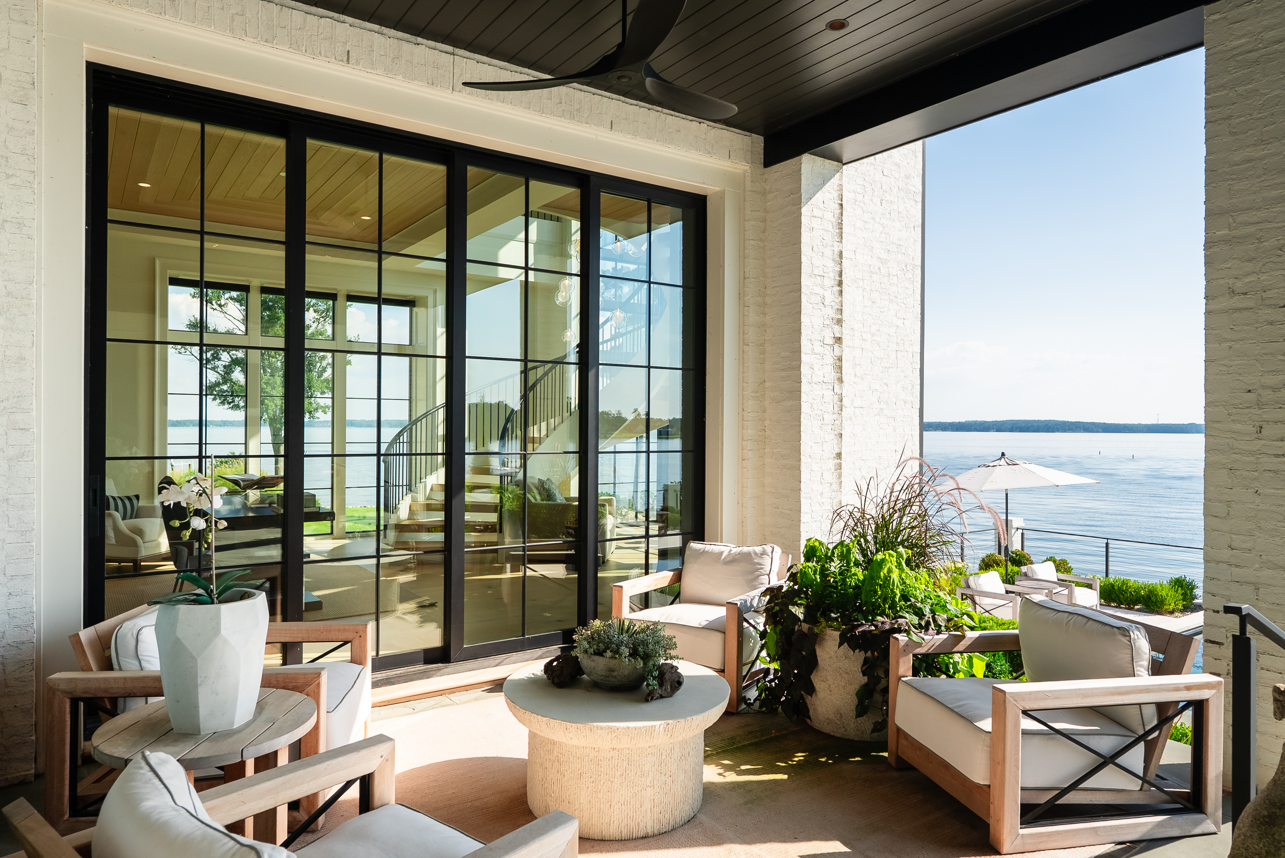 Modern luxury Low Country home at dusk — professional real estate photography by Elevated Productions