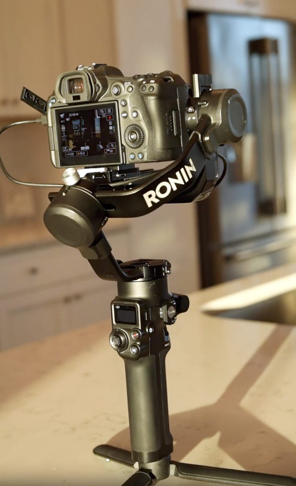 Videographer filming a real estate property interior